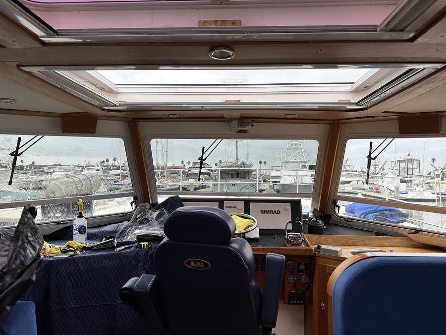 Yacht helm and pilothouse window tinting at Central Coast marina
